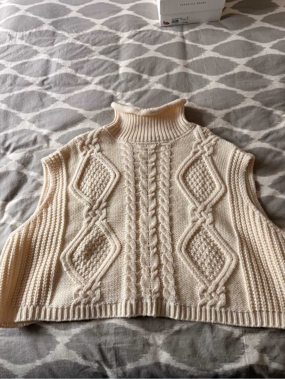 Cable-Knit Sleeveless Turtleneck Sweater Vest in Ivory